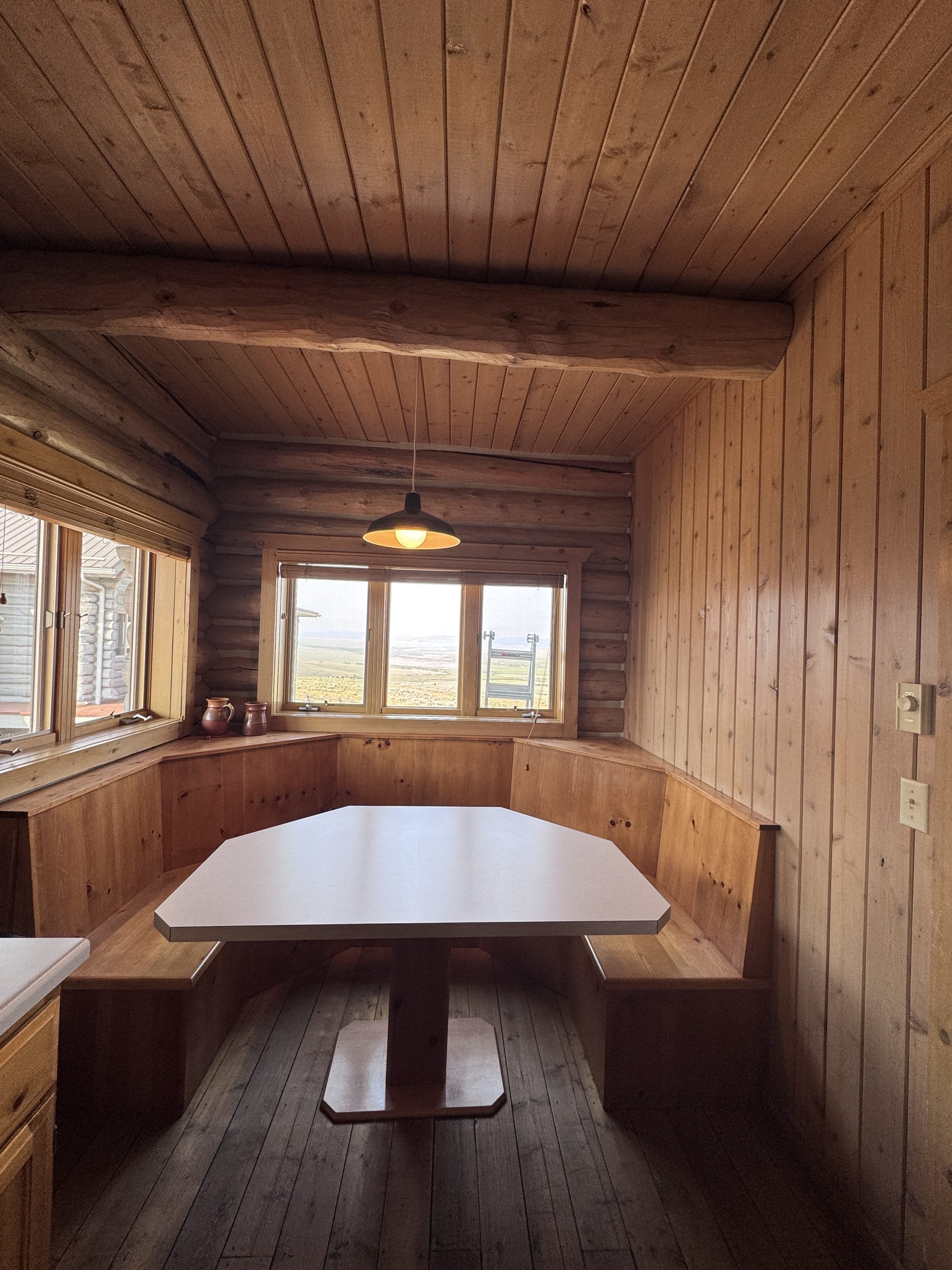 Built-in breakfast nook with valley-view windows