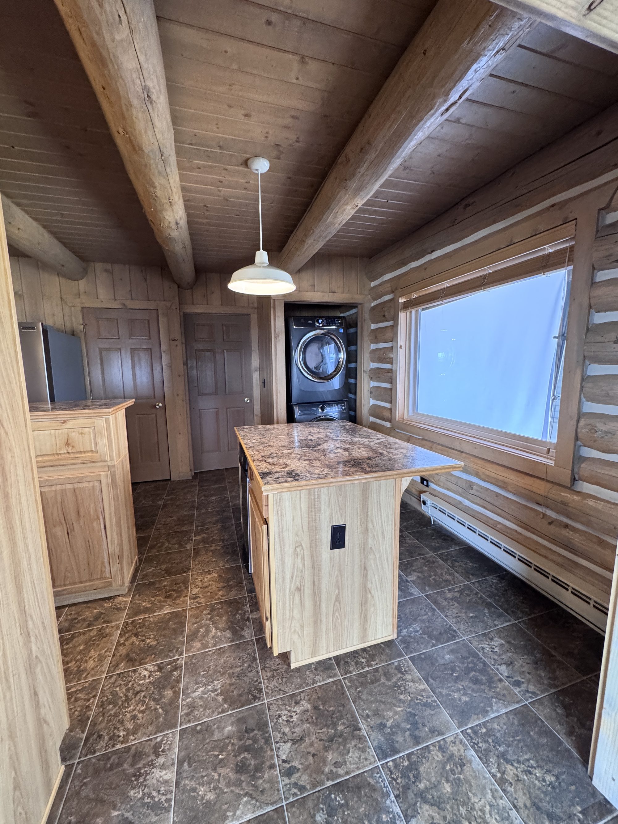 Gas range, dishwasher, and hickory cabinets
