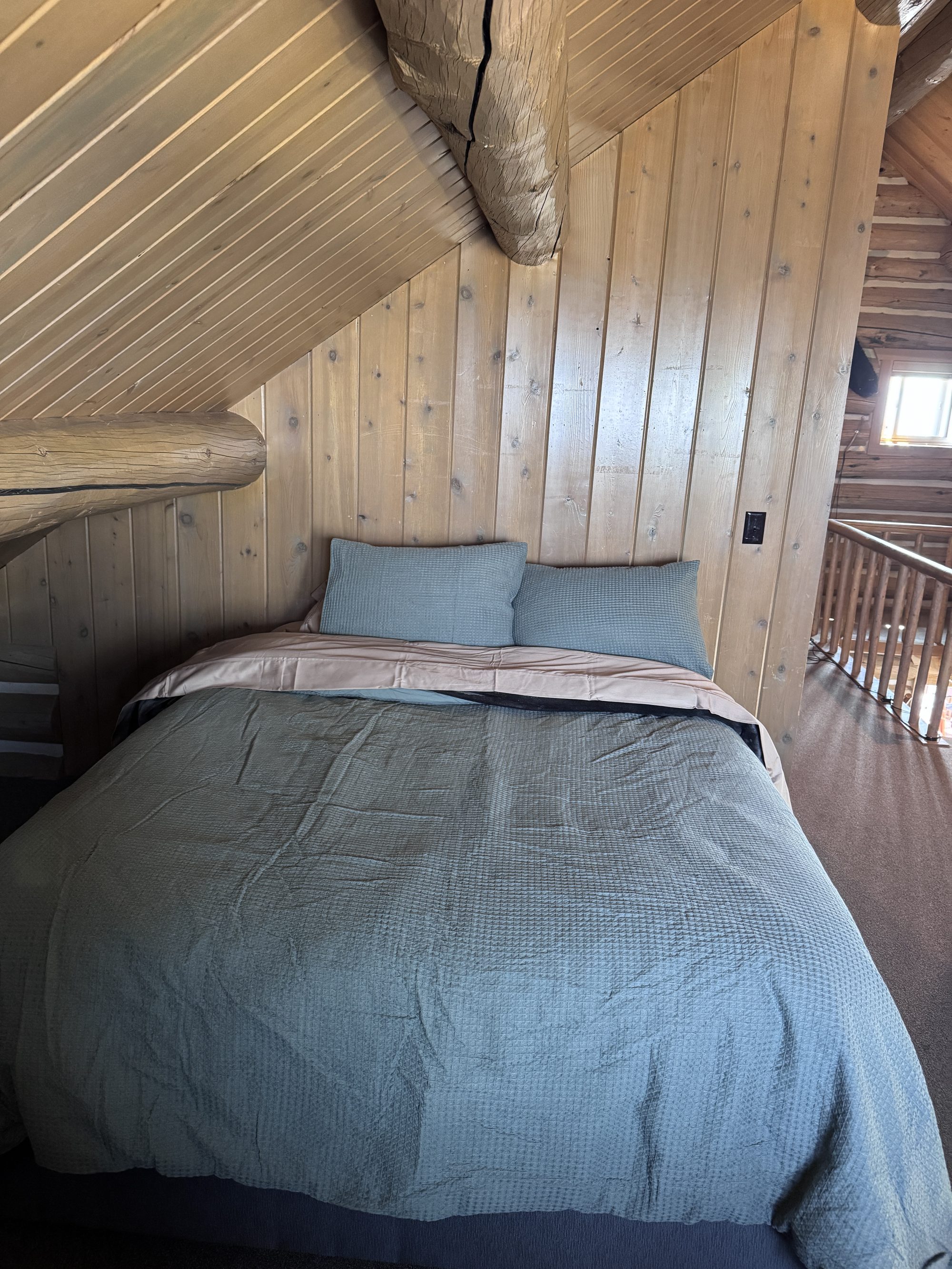 Queen bed in the sleeping loft