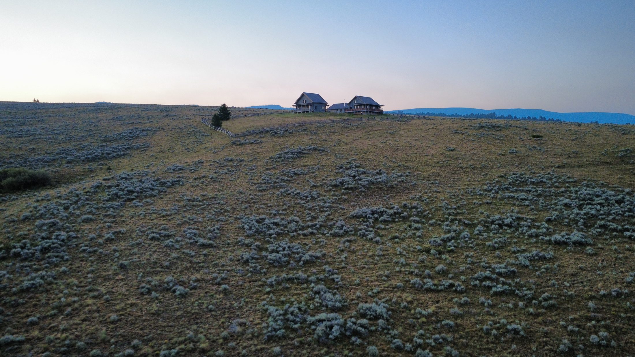 First light over the compound and the Big Hole beyond