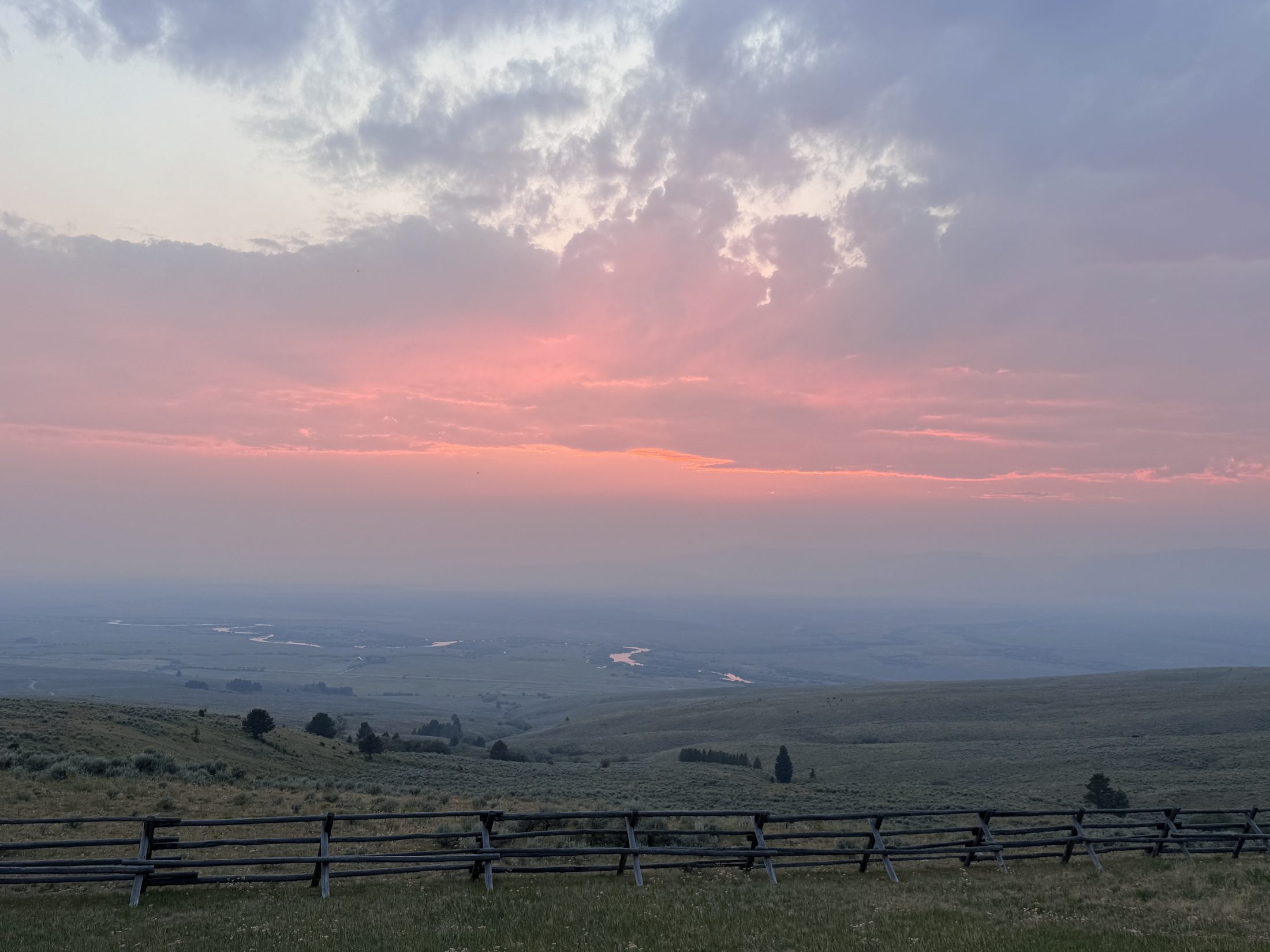 Sunset over the fence line at The Road To Wisdom