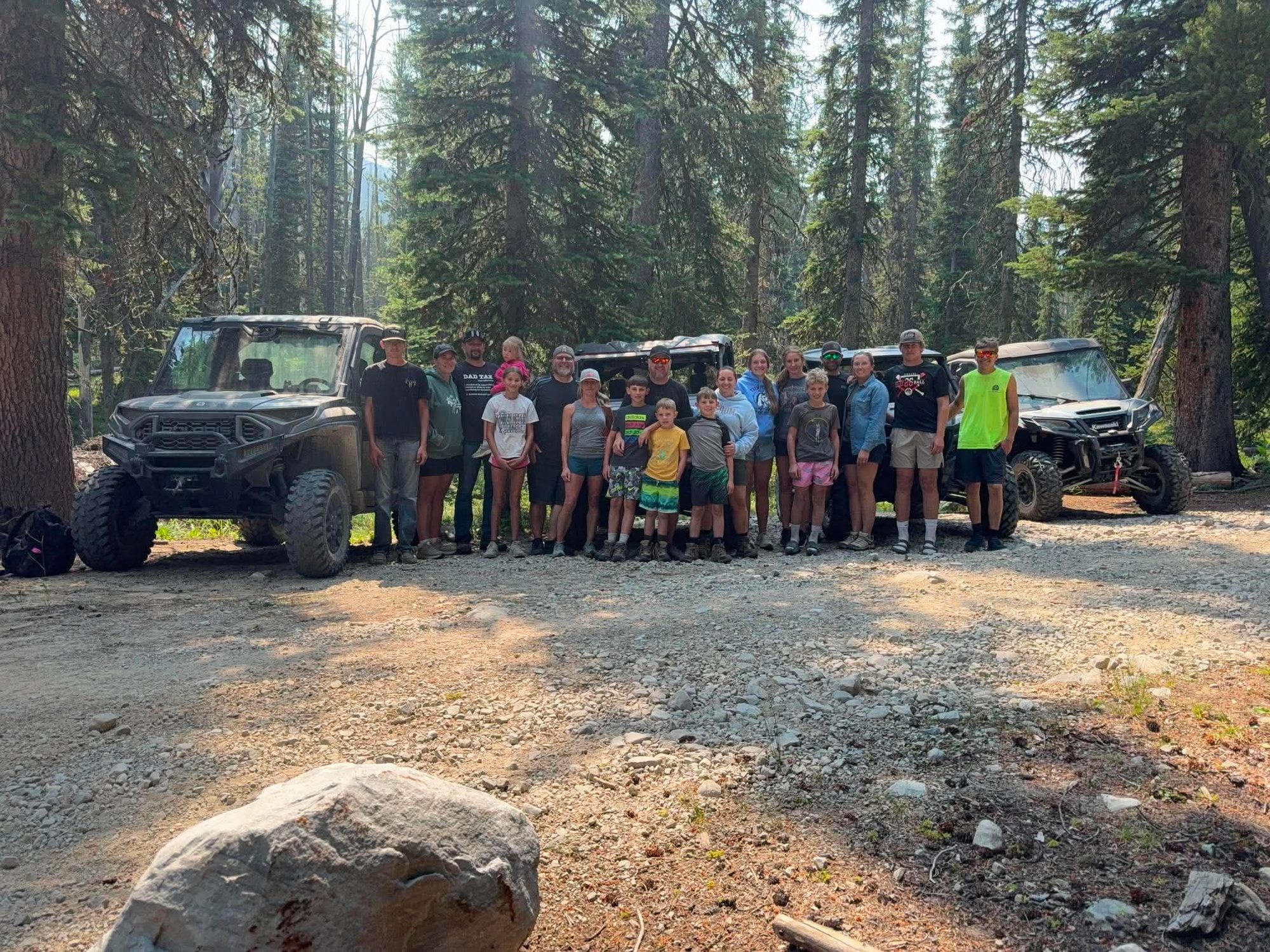 The whole crew — three families out riding together